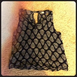 Cute old navy blue tang top with flower pattern